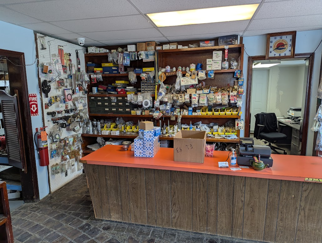 Facing the customer counter and office at Sanford Plumbing Supplies