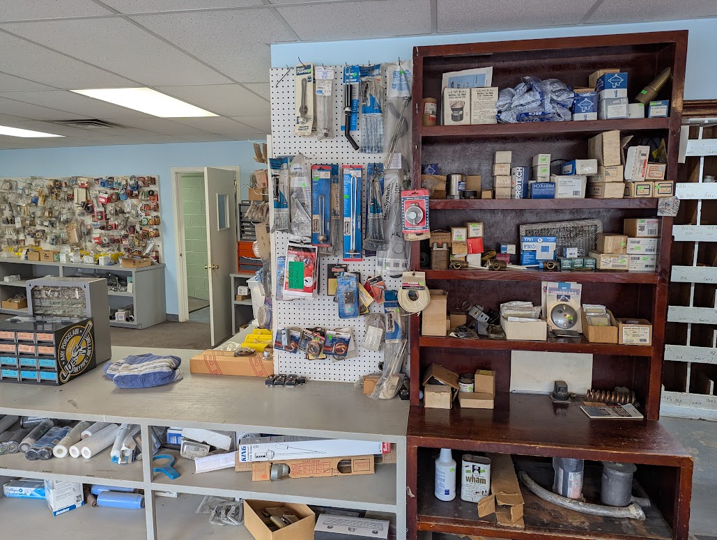 Pegboard wall and inventory inside Sanford’s parts shop